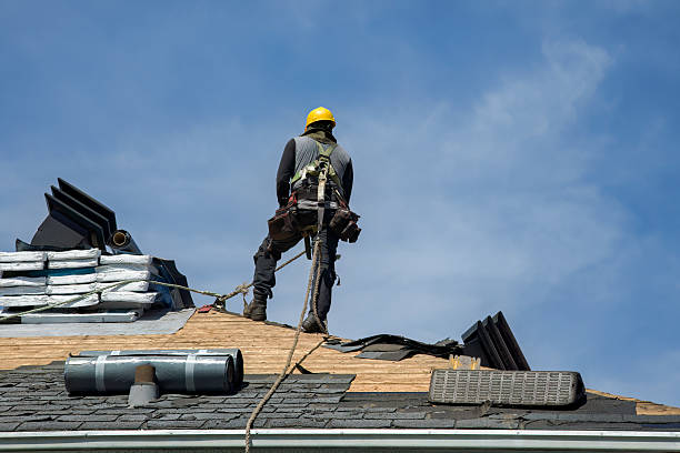 Professional Roof Replacement technician working in White Sulphur Springs, NY